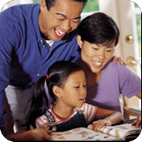 image of parents sitting down with young girl reading
