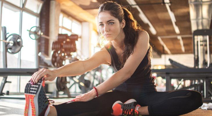 Woman does her therapeutic exercises.